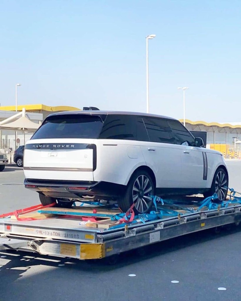 SUV secured on a flatbed trailer